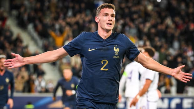 Benjamin Pavard pictured celebrating after scoring for France against Scotland in October 2023